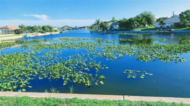 Waterfront Pool Home with Solar in exclusive Cape Coral! Welcome on El Rio Golf Course and Club in Florida - for sale on GolfHomes.com, golf home, golf lot