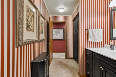 Step into timeless elegance with this beautifully crafted home on Waukon Golf and Country Club in Iowa - for sale on GolfHomes.com, golf home, golf lot
