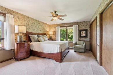 Step into timeless elegance with this beautifully crafted home on Waukon Golf and Country Club in Iowa - for sale on GolfHomes.com, golf home, golf lot