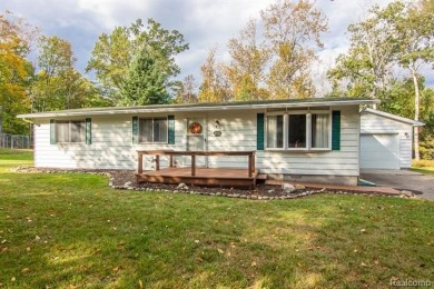 This well cared for ranch style home at Lost Lake Woods Club on Lost Lake Woods Club in Michigan - for sale on GolfHomes.com, golf home, golf lot