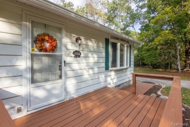This well cared for ranch style home at Lost Lake Woods Club on Lost Lake Woods Club in Michigan - for sale on GolfHomes.com, golf home, golf lot