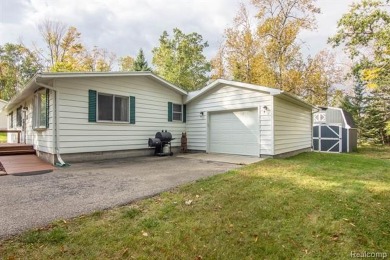 This well cared for ranch style home at Lost Lake Woods Club on Lost Lake Woods Club in Michigan - for sale on GolfHomes.com, golf home, golf lot