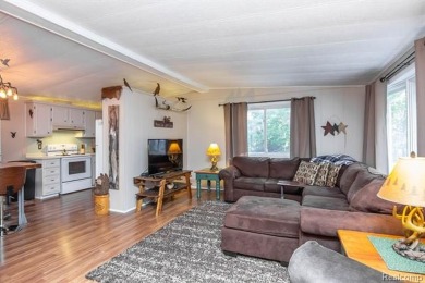 This well cared for ranch style home at Lost Lake Woods Club on Lost Lake Woods Club in Michigan - for sale on GolfHomes.com, golf home, golf lot