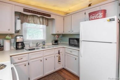 This well cared for ranch style home at Lost Lake Woods Club on Lost Lake Woods Club in Michigan - for sale on GolfHomes.com, golf home, golf lot