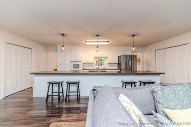 Spacious Ranch on the 12th Fairway in Carolina Trace! Welcome to on Carolina Trace Country Club in North Carolina - for sale on GolfHomes.com, golf home, golf lot