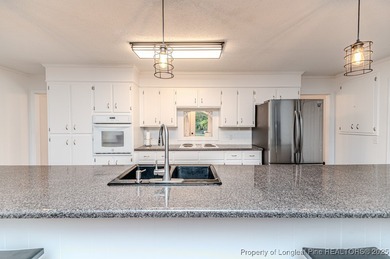 Spacious Ranch on the 12th Fairway in Carolina Trace! Welcome to on Carolina Trace Country Club in North Carolina - for sale on GolfHomes.com, golf home, golf lot