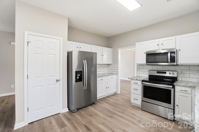 Welcome to this beautifully updated 3BR/2.5BA home with a on Highland Creek Golf Club in North Carolina - for sale on GolfHomes.com, golf home, golf lot