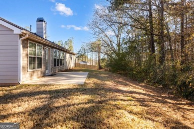 Welcome to this meticulously maintained ranch-style home in the on Canongate At Heron Bay in Georgia - for sale on GolfHomes.com, golf home, golf lot