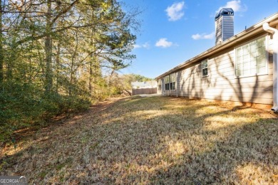 Welcome to this meticulously maintained ranch-style home in the on Canongate At Heron Bay in Georgia - for sale on GolfHomes.com, golf home, golf lot