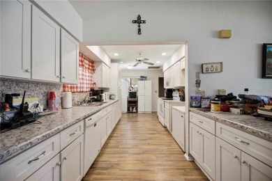 Step into your Florida dream with this immaculate 3-bedroom on Deep Creek Golf Club in Florida - for sale on GolfHomes.com, golf home, golf lot