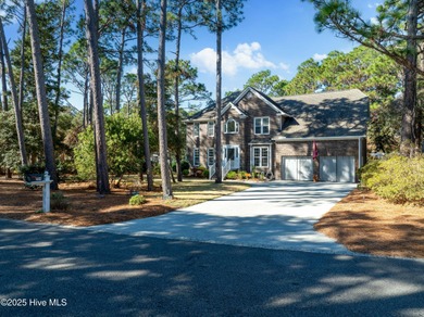 Discover this beautifully remodeled, brick traditional two-story on Oak Island Golf Club in North Carolina - for sale on GolfHomes.com, golf home, golf lot