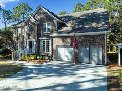 Discover this beautifully remodeled, brick traditional two-story on Oak Island Golf Club in North Carolina - for sale on GolfHomes.com, golf home, golf lot