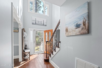 Discover this beautifully remodeled, brick traditional two-story on Oak Island Golf Club in North Carolina - for sale on GolfHomes.com, golf home, golf lot