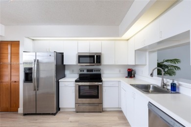 This beautifully updated 4th -floor condo offers stunning lake on Flamingo Lakes Country Club in Florida - for sale on GolfHomes.com, golf home, golf lot
