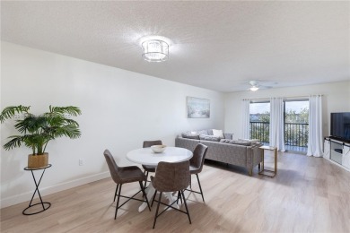 This beautifully updated 4th -floor condo offers stunning lake on Flamingo Lakes Country Club in Florida - for sale on GolfHomes.com, golf home, golf lot