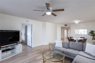 This beautifully updated 4th -floor condo offers stunning lake on Flamingo Lakes Country Club in Florida - for sale on GolfHomes.com, golf home, golf lot