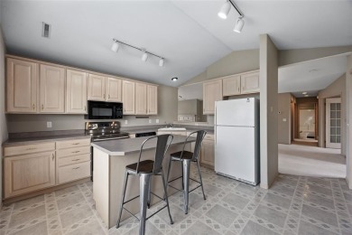Welcome to 4960 Lucore Rd, a spacious 3-bedroom, 2-bath home on Hunters Ridge Golf Course in Iowa - for sale on GolfHomes.com, golf home, golf lot