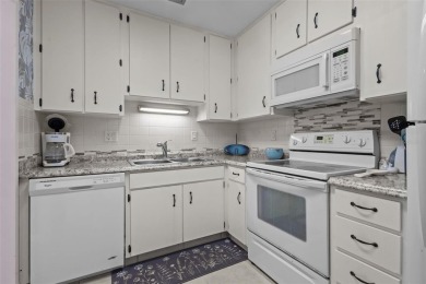 Experience the charm of coastal living in this beautifully on The Dunedin Country Club in Florida - for sale on GolfHomes.com, golf home, golf lot