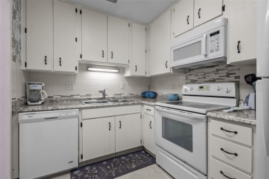 Experience the charm of coastal living in this beautifully on The Dunedin Country Club in Florida - for sale on GolfHomes.com, golf home, golf lot