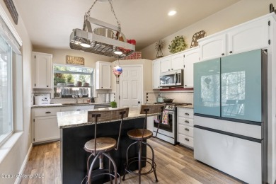 Located  across the street from Hayden Lake, this exceptional on Avondale Golf and Tennis Club in Idaho - for sale on GolfHomes.com, golf home, golf lot