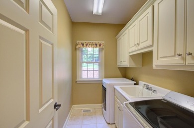 Stunning custom brick home located in the prestigious Carolina on The Carolina Country Club in South Carolina - for sale on GolfHomes.com, golf home, golf lot