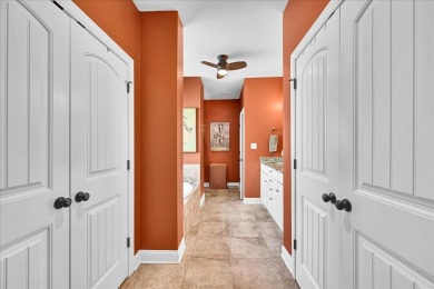 Enjoy true lock and go living in this beautiful gated, lakefront on The Patriot Golf Club At Grand Harbor in South Carolina - for sale on GolfHomes.com, golf home, golf lot