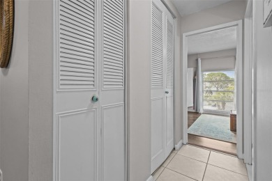 Experience the charm of coastal living in this beautifully on The Dunedin Country Club in Florida - for sale on GolfHomes.com, golf home, golf lot
