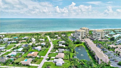 OCEAN VIEWS! Beautiful 2 bedroom 2 bath & 1 car garage at on Ocean Village Golf Course in Florida - for sale on GolfHomes.com, golf home, golf lot