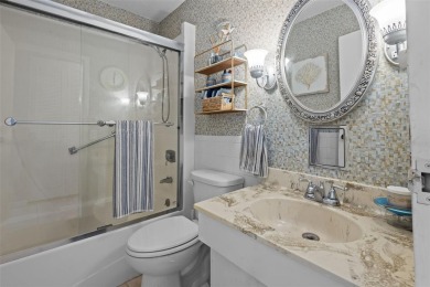 Experience the charm of coastal living in this beautifully on The Dunedin Country Club in Florida - for sale on GolfHomes.com, golf home, golf lot