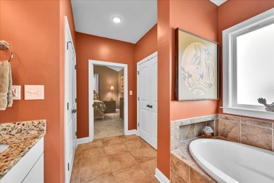 Enjoy true lock and go living in this beautiful gated, lakefront on The Patriot Golf Club At Grand Harbor in South Carolina - for sale on GolfHomes.com, golf home, golf lot