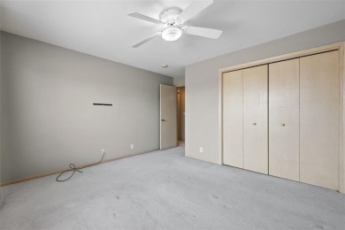 Welcome to 4960 Lucore Rd, a spacious 3-bedroom, 2-bath home on Hunters Ridge Golf Course in Iowa - for sale on GolfHomes.com, golf home, golf lot