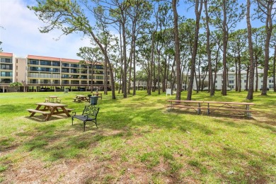 Experience the charm of coastal living in this beautifully on The Dunedin Country Club in Florida - for sale on GolfHomes.com, golf home, golf lot