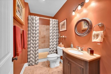 Enjoy true lock and go living in this beautiful gated, lakefront on The Patriot Golf Club At Grand Harbor in South Carolina - for sale on GolfHomes.com, golf home, golf lot