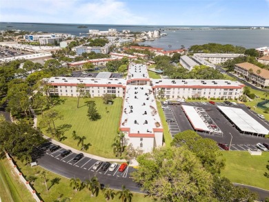 Experience the charm of coastal living in this beautifully on The Dunedin Country Club in Florida - for sale on GolfHomes.com, golf home, golf lot
