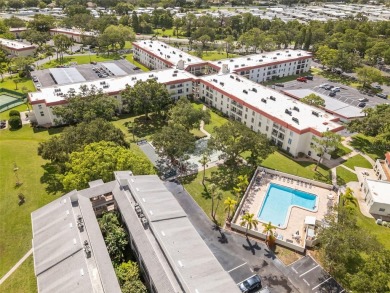 Experience the charm of coastal living in this beautifully on The Dunedin Country Club in Florida - for sale on GolfHomes.com, golf home, golf lot
