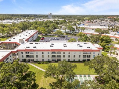 Experience the charm of coastal living in this beautifully on The Dunedin Country Club in Florida - for sale on GolfHomes.com, golf home, golf lot