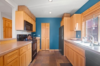 Charming chalet located on the 14th fairway in one of Central on Eagle Crest Golf Resort - Ridge Course in Oregon - for sale on GolfHomes.com, golf home, golf lot