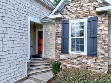 Enjoy true lock and go living in this beautiful gated, lakefront on The Patriot Golf Club At Grand Harbor in South Carolina - for sale on GolfHomes.com, golf home, golf lot