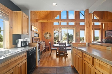 Charming chalet located on the 14th fairway in one of Central on Eagle Crest Golf Resort - Ridge Course in Oregon - for sale on GolfHomes.com, golf home, golf lot