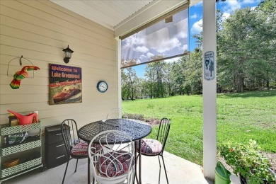 Enjoy true lock and go living in this beautiful gated, lakefront on The Patriot Golf Club At Grand Harbor in South Carolina - for sale on GolfHomes.com, golf home, golf lot