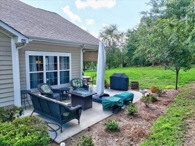 Enjoy true lock and go living in this beautiful gated, lakefront on The Patriot Golf Club At Grand Harbor in South Carolina - for sale on GolfHomes.com, golf home, golf lot