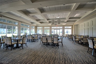 This spacious corner end unit delivers the South Florida on Hideaway Country Club in Florida - for sale on GolfHomes.com, golf home, golf lot