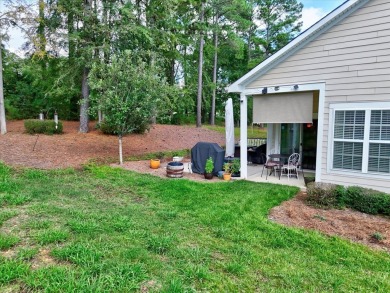 Enjoy true lock and go living in this beautiful gated, lakefront on The Patriot Golf Club At Grand Harbor in South Carolina - for sale on GolfHomes.com, golf home, golf lot