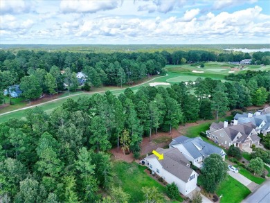 Enjoy true lock and go living in this beautiful gated, lakefront on The Patriot Golf Club At Grand Harbor in South Carolina - for sale on GolfHomes.com, golf home, golf lot