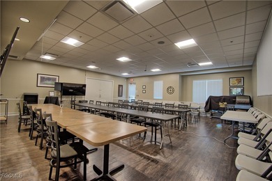 This spacious corner end unit delivers the South Florida on Hideaway Country Club in Florida - for sale on GolfHomes.com, golf home, golf lot