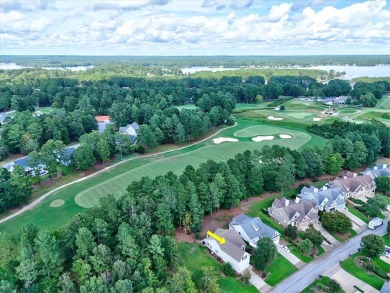 Enjoy true lock and go living in this beautiful gated, lakefront on The Patriot Golf Club At Grand Harbor in South Carolina - for sale on GolfHomes.com, golf home, golf lot