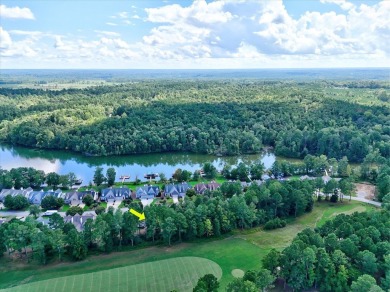 Enjoy true lock and go living in this beautiful gated, lakefront on The Patriot Golf Club At Grand Harbor in South Carolina - for sale on GolfHomes.com, golf home, golf lot