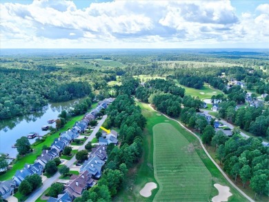 Enjoy true lock and go living in this beautiful gated, lakefront on The Patriot Golf Club At Grand Harbor in South Carolina - for sale on GolfHomes.com, golf home, golf lot