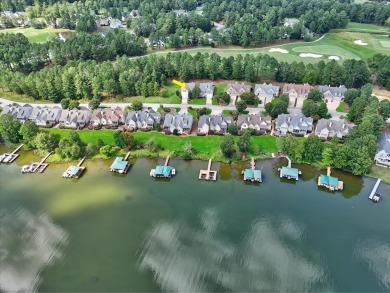Enjoy true lock and go living in this beautiful gated, lakefront on The Patriot Golf Club At Grand Harbor in South Carolina - for sale on GolfHomes.com, golf home, golf lot