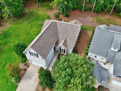 Enjoy true lock and go living in this beautiful gated, lakefront on The Patriot Golf Club At Grand Harbor in South Carolina - for sale on GolfHomes.com, golf home, golf lot